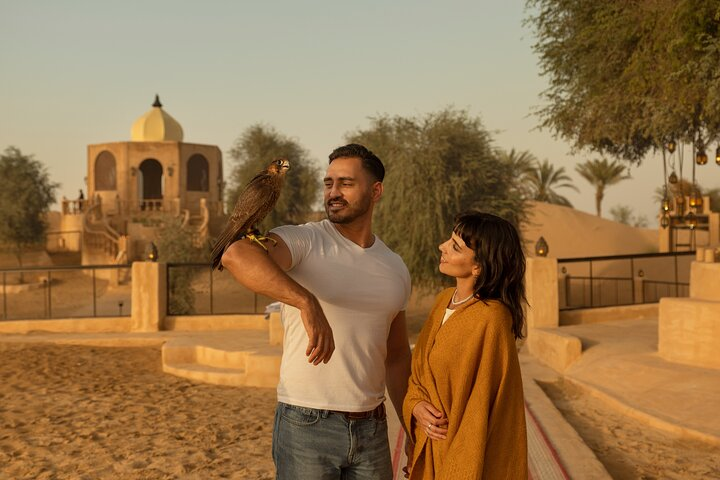 Experience the magic of Dubai's desert as you connect with majestic falcons explore stunning landscapes and indulge in luxurious Arabian hospitality under the mesmerizing desert sky.